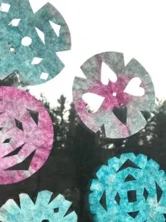 How to Make Coffee Filter Snowflakes a Winter Craft for Kids - ThatKidsCraftSite.com