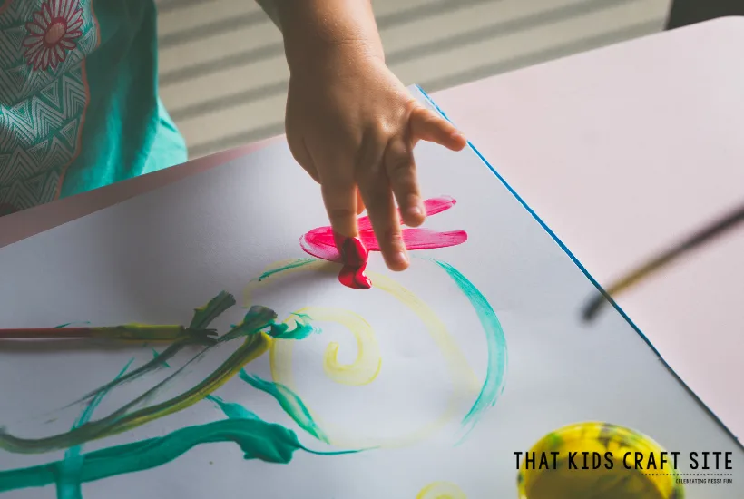 Toddler Fingerpainting on Tinfoil